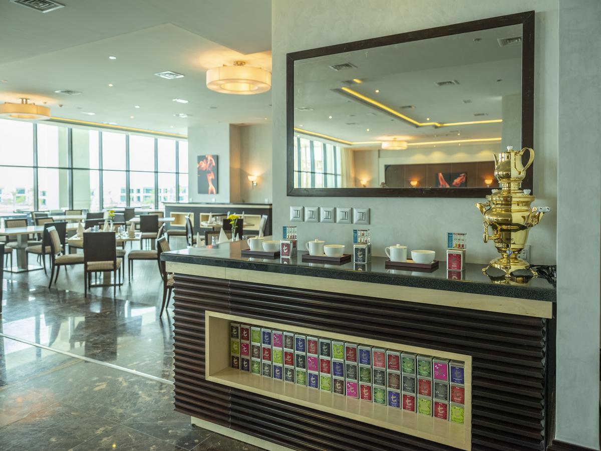레타즈 살와 리조트 앤 스파 도하 외부 사진 The lounge at the airport
