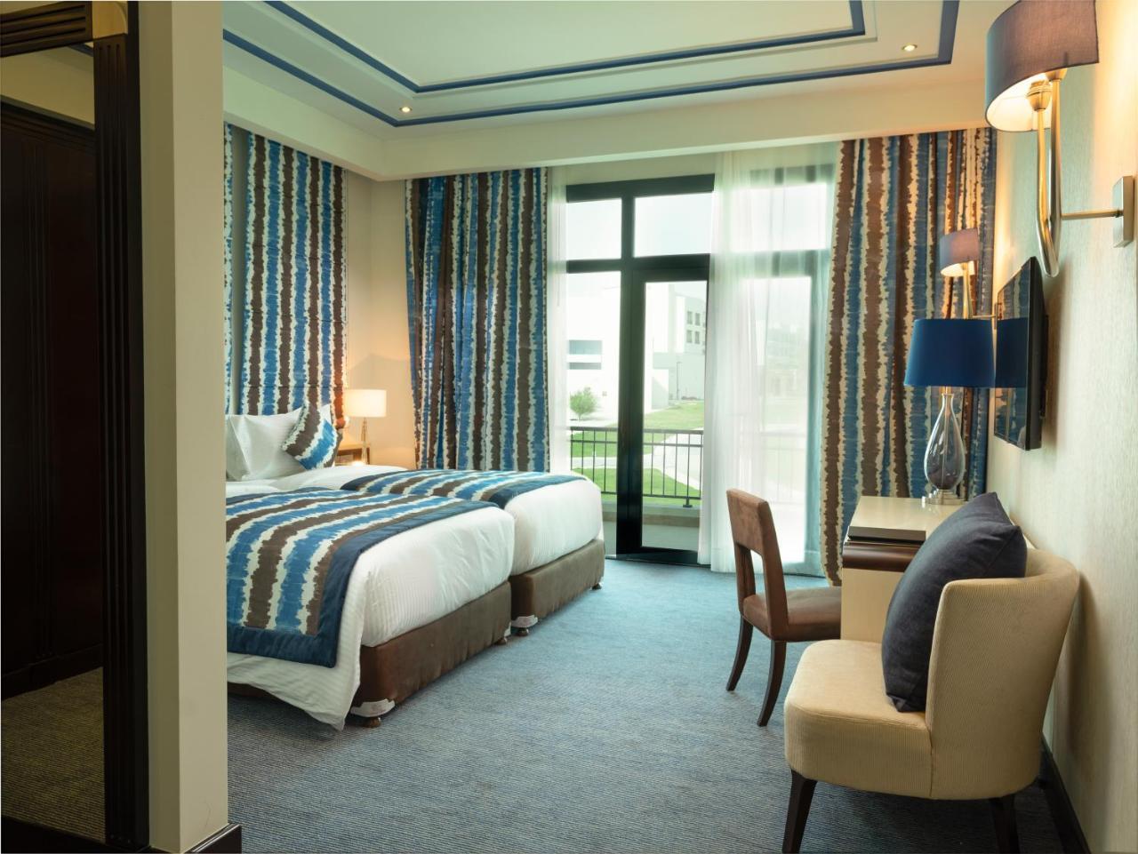레타즈 살와 리조트 앤 스파 도하 외부 사진 A room at the hotel
