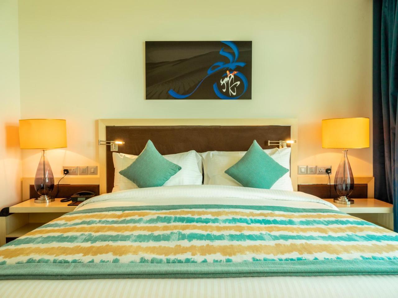레타즈 살와 리조트 앤 스파 도하 외부 사진 A bedroom at the hotel